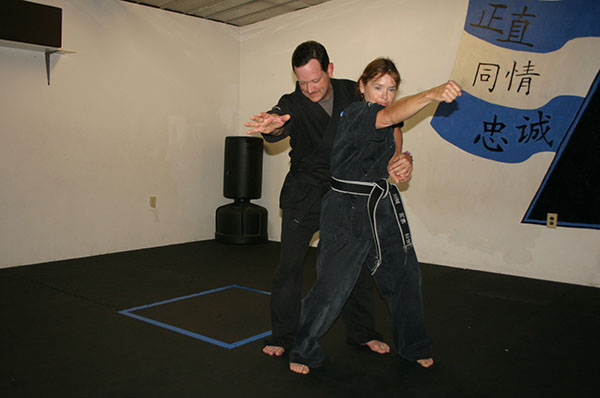 Kempo Karate punch out to break bear hug from behind